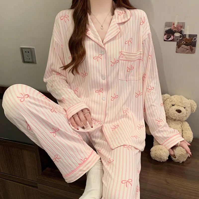 Pyjama femme rose rayé à imprimé nœuds