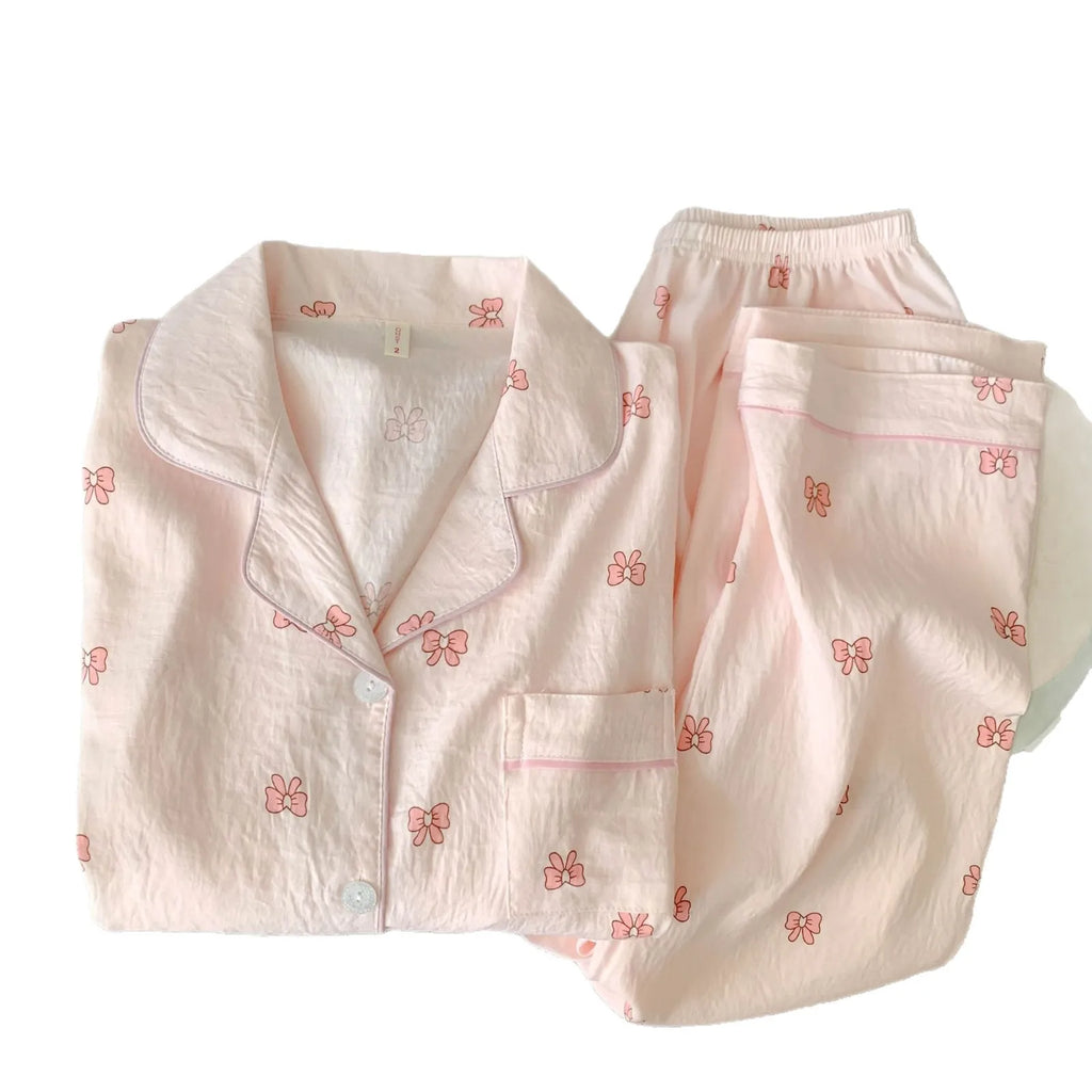 Ensemble pyjama femme rose à petits nœuds