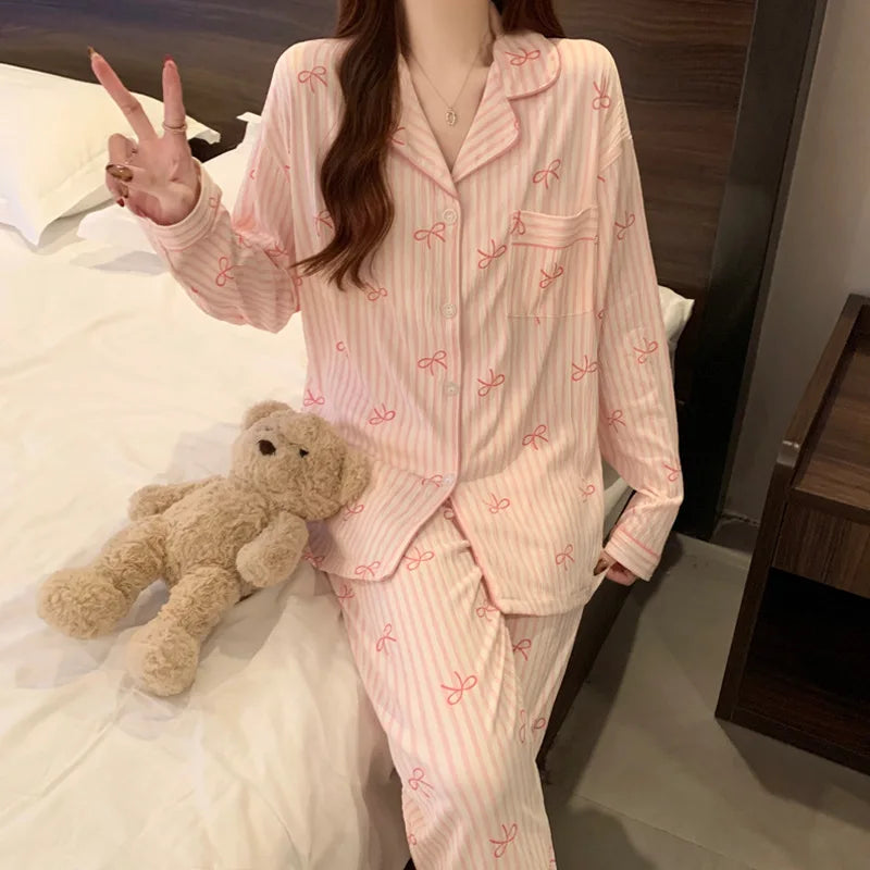 Pyjama femme rose rayé à imprimé nœuds