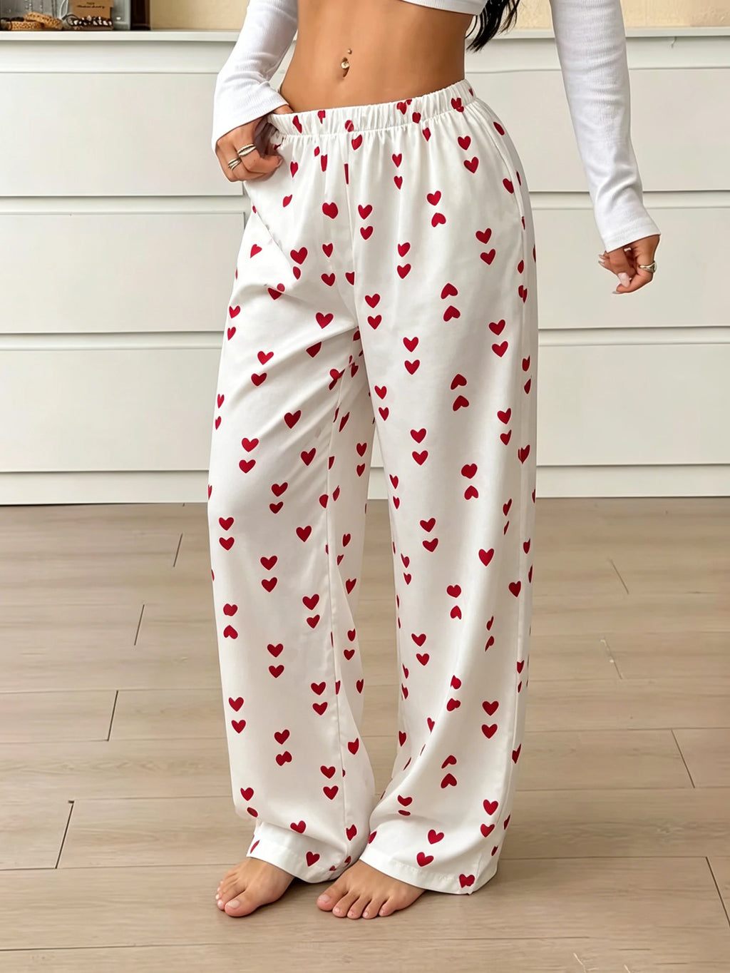 Pantalon de pyjama femme satiné à cœurs rouges