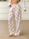 Pantalon de pyjama femme satiné à cœurs rouges