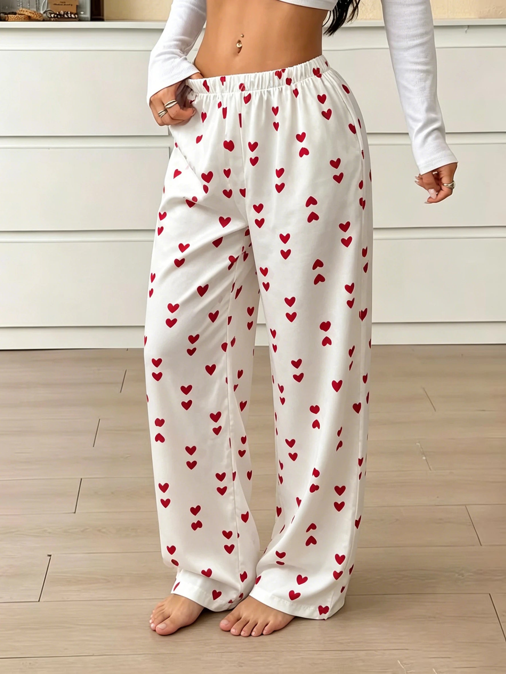 Pantalon de pyjama femme satiné à cœurs rouges