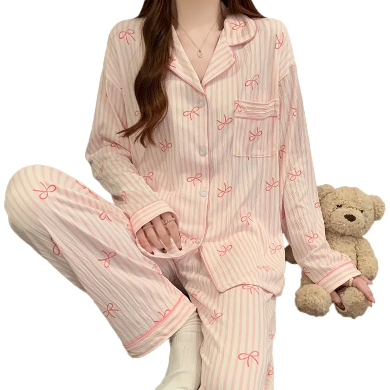 Pyjama femme rose rayé à imprimé nœuds