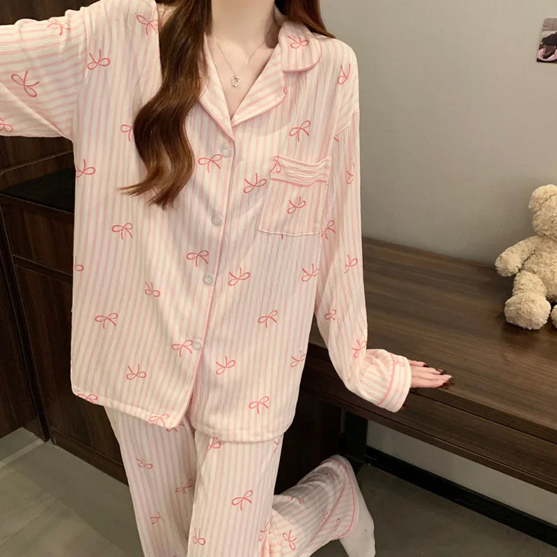 Pyjama femme rose rayé à imprimé nœuds