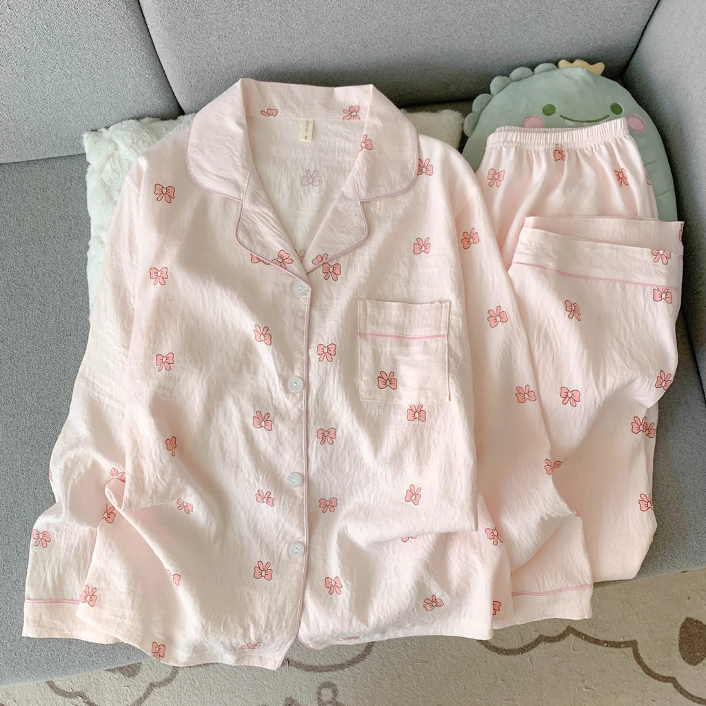 Ensemble pyjama femme rose à petits nœuds