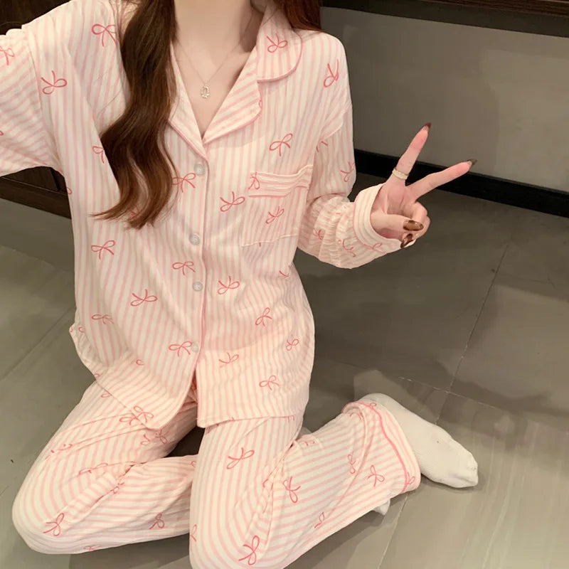 Pyjama femme rose rayé à imprimé nœuds