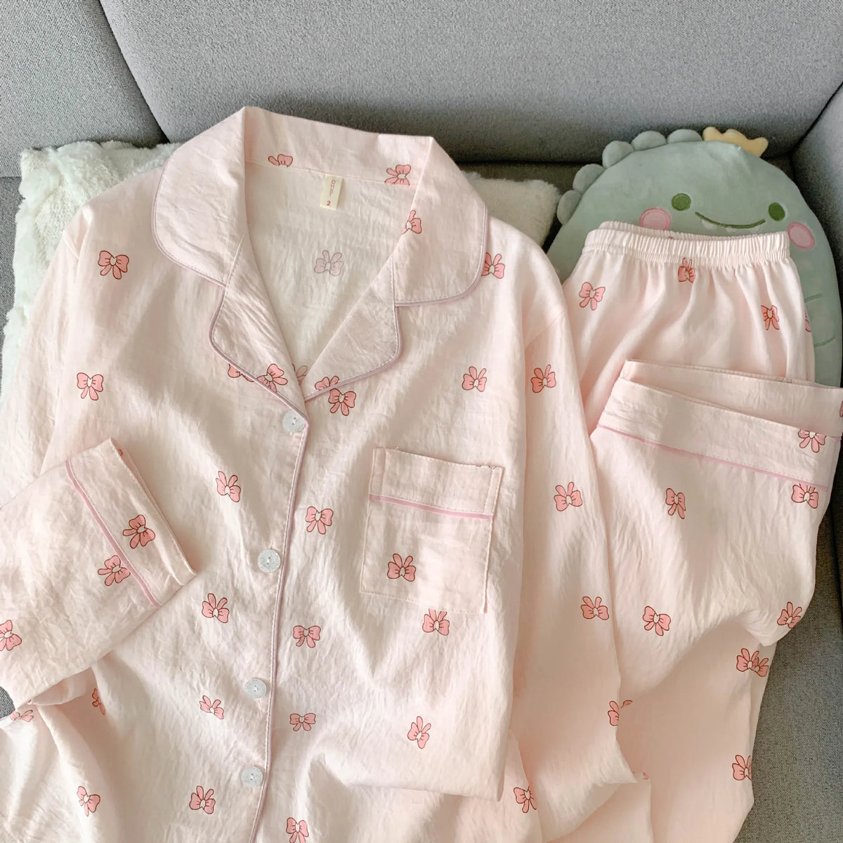 Ensemble pyjama femme rose à petits nœuds