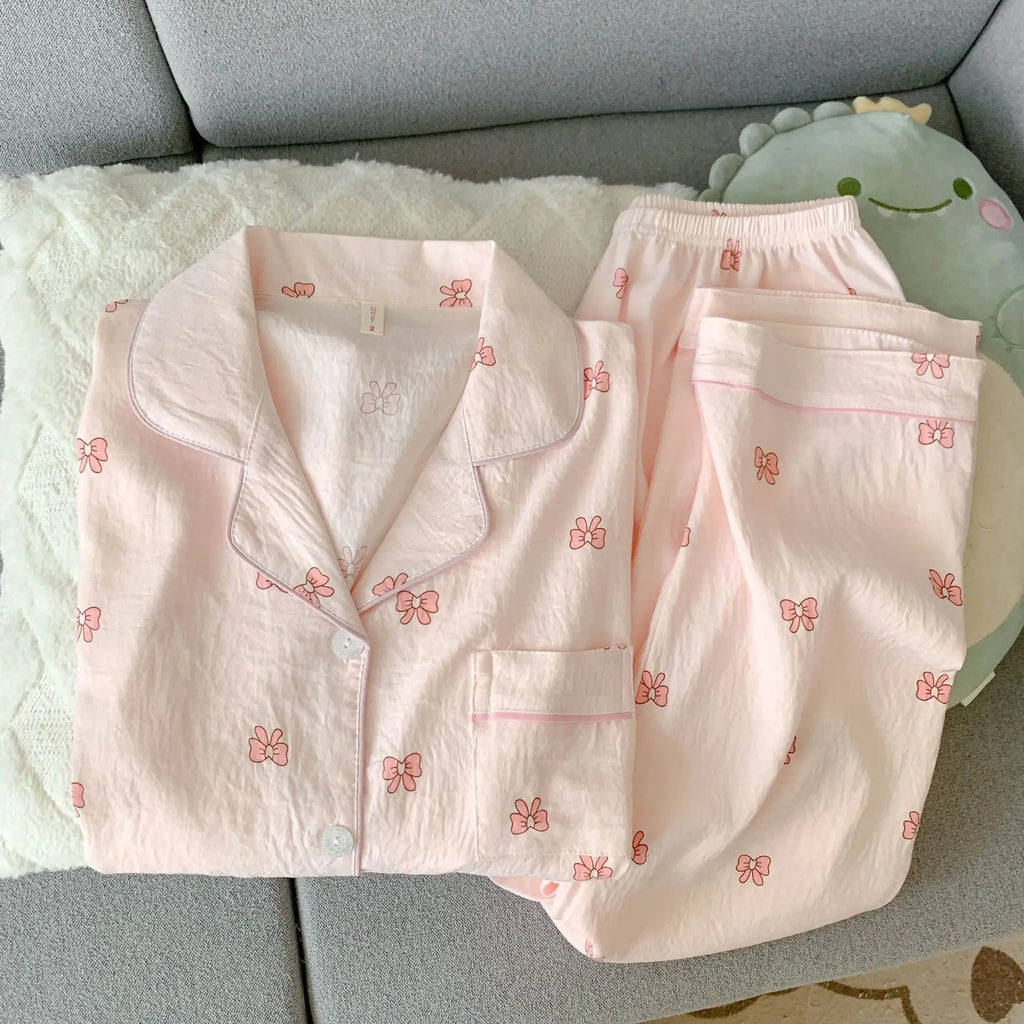 Ensemble pyjama femme rose à petits nœuds
